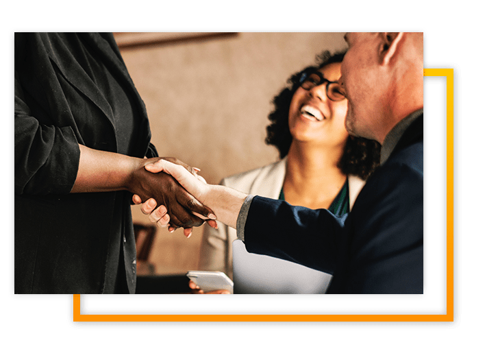 Group of people shaking hands