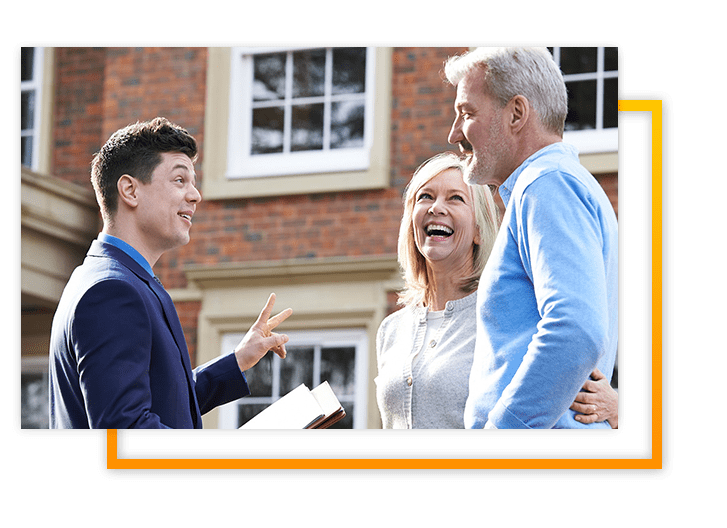 Couple being shown a house by a realtor